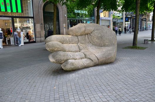 Antwerp, Belgium - May 10, 2015: Giant Hand statue on Meir street, The main shopping street in Antwerp, Belgium