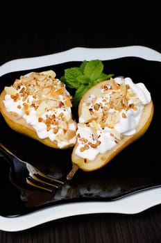 pears with whipped cream sprinkled   nuts and almonds