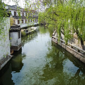 ZHOUZHUANG, SHANGHAI - April 11, 2011 : Zhouzhuang, the ancient water village is Shanghai tourist attraction with 1,000,000 visitors per year and there are a lot of variety activities have done here.