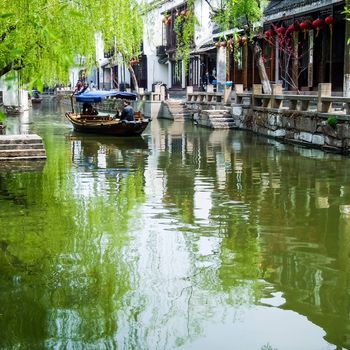 ZHOUZHUANG, SHANGHAI - April 11, 2011 : Zhouzhuang, the ancient water village is Shanghai tourist attraction with 1,000,000 visitors per year and there are a lot of variety activities have done here.