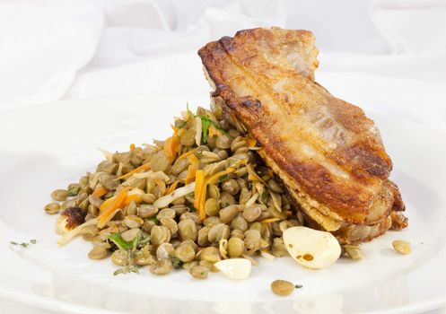 Baked Bacon with green and yellow lentil