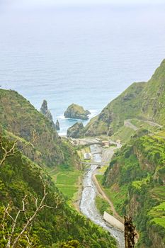 View from the hiking trail Levada do Central da Ribeira da Janela to the Atlantic Ocean, north coast of Madeira