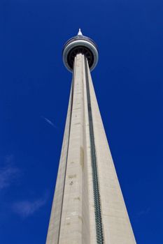 The beautiful background with the blue sky and CN Tower like an arrow