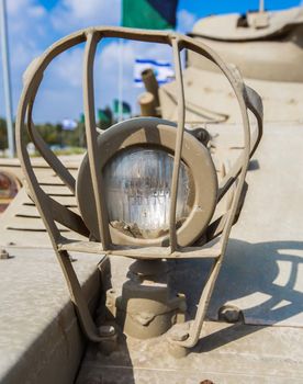 Headlight of the old military equipment close-up