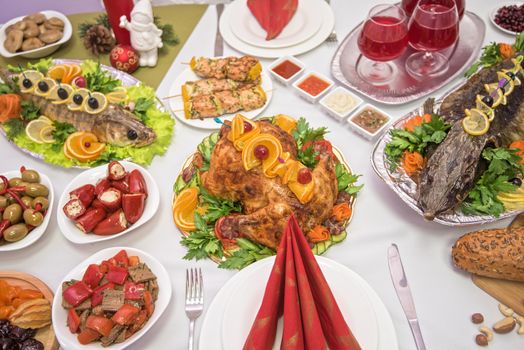 Lots of traditional festive food on table. Christmas table.