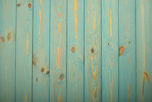 Light blue vintage rustic aged painted wooden panel with vertical planks