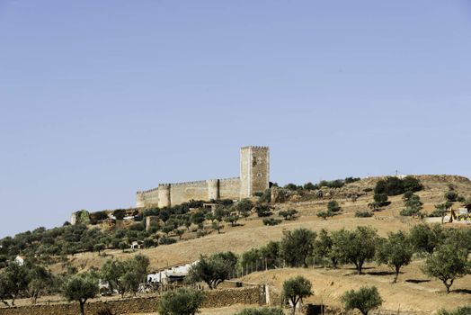 hill in portugal with castel evora