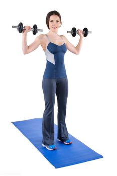 young woman fitness instructor shows starting position of standing dumbbell shoulder press, isolated on white