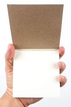 small writing pad in hand . Insert text on paper