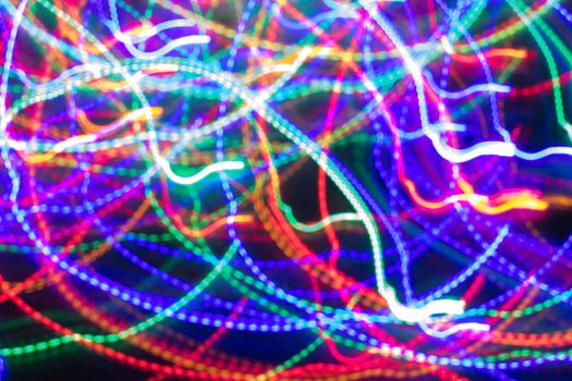 futuristic abstract glowing background resembling motion blurred neon light curves, abstract background