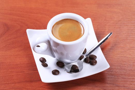 Cup of espresso with golden brown foam