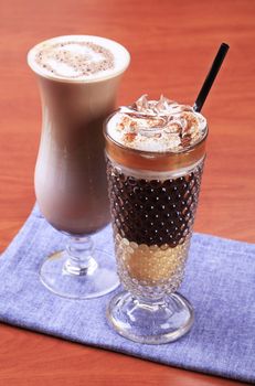 Coffee and chocolate drinks in tall glasses