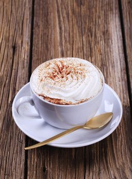 Cup of coffee with whipped cream