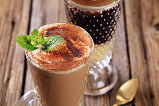 Coffee and chocolate drinks in tall glasses