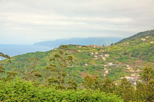View from the hiking trail Levada do Central da Ribeira da Janela to the Atlantic Ocean, north coast of Madeira