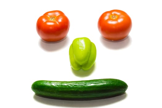 The photo shows vegetables on a white background