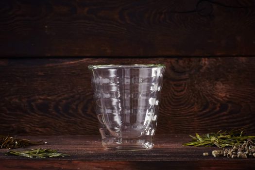 Thermo tea cup, loose tea leaf on wood table