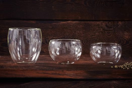 Thermo tea cup, loose tea leaf on wood table