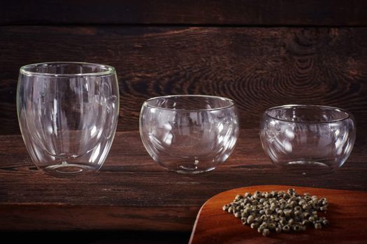 Thermo tea cup, loose tea leaf on wood table