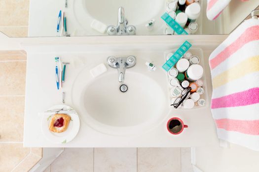 Day starts in the bathroom, domestic bathtub and coffee along with danish pastry for a fast day