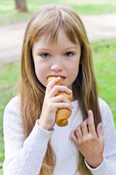 Photo of eating cute girl with long hair