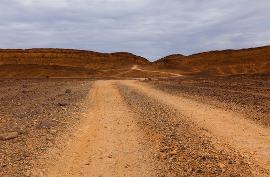 road to the Sahara desert comes to mountains, Morocco