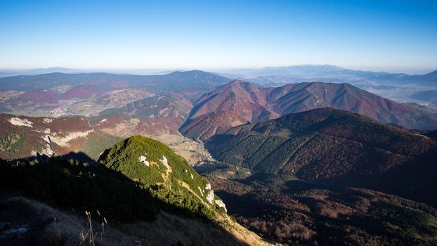 Landscape view of colorful mountain hills in fall, moody autumn style, Mala Fatra, Slovakia