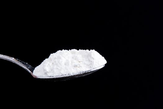 Could be used for drugs or cooking as it is a generic looking white powder