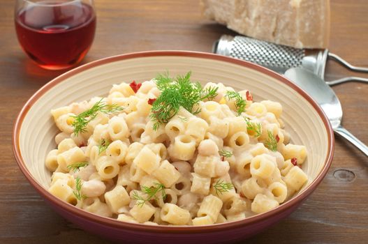 Pasta and beans with bacon and wild Finocchieto, italy