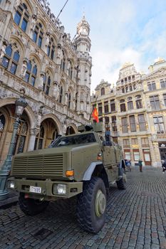 BELGIUM, Brussels: A Belgian military vehicle is seen in front of Brussels city hall, on November 22, 2015, after level four was set for Brussels based on a serious and imminent terror attacks threat. The city's subway system was closed and heavily armed police and soldiers patrolled the streets just over a week after more than 130 were killed in gun and bomb attacks in Paris. Many of the Paris attackers lived in Belgium, including one who is still at large.