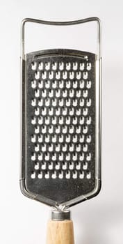 Grater Kitchen Utensil close up on white background.
