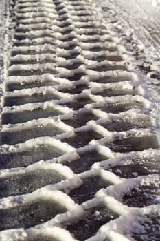 Tractor Track in Snow and ice.