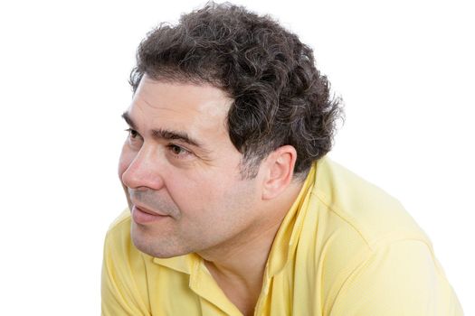 Close up Curly Middle-Aged Man Listening to Something Carefully While Looking to the Left of the Frame, Isolated on White Background.