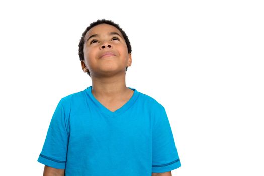 Half Body Shot of a Thoughtful African American Boy Looking Up High Against White Background.