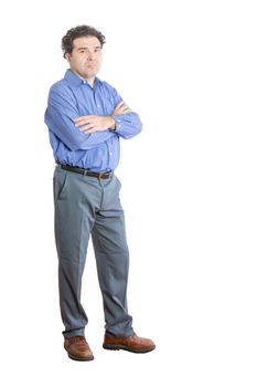 Full Length Shot of an Upset Businessman Looking at the Camera with Arms Crossing Over his Chest. Isolated on a White Background.