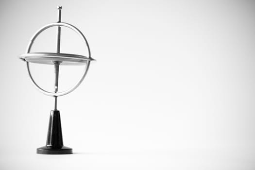Gyroscope composed of a free rotating wheel and a spinning axis, uses Earths gravity to determine orientation