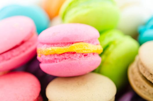 French colorful macarons background, close up
