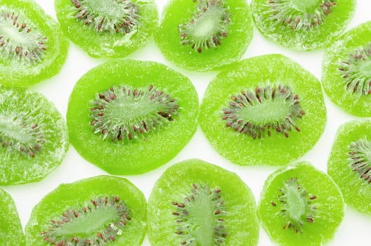 Dried kiwi as background on white background.