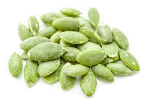 Dried green Pumpkin Seeds on White Background