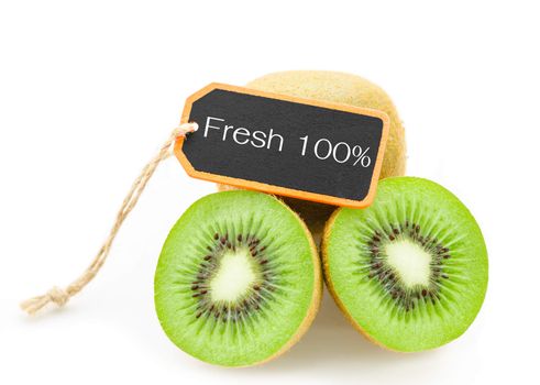 Slice of fresh kiwi fruit and Fresh 100% wooden tag isolated on white background