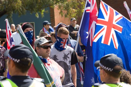 MELTON, VICTORIA/AUSTRALIA - NOVEMBER 2015: Anti Racism protesters violently clashed with reclaim australia groups rallying agsint Mulsim immigration.