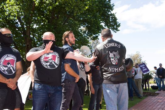 MELTON, VICTORIA/AUSTRALIA - NOVEMBER 2015: Anti Racism protesters violently clashed with reclaim australia groups rallying agsint Mulsim immigration.