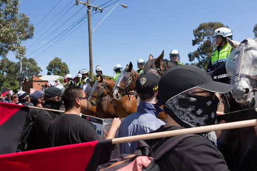 MELTON, VICTORIA/AUSTRALIA - NOVEMBER 2015: Anti Racism protesters violently clashed with reclaim australia groups rallying agsint Mulsim immigration.