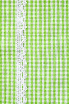 Greeen and white tablecloth italian style with white lace texture wallpaper or background.