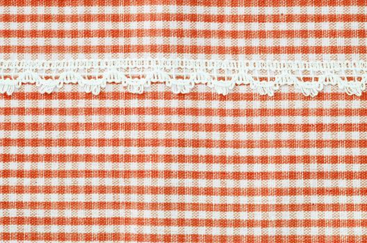 Beautiful red and white tablecloth italian style with white lace texture wallpaper or background.