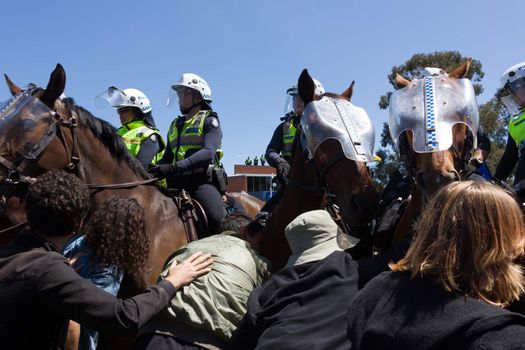 MELTON, VICTORIA/AUSTRALIA - NOVEMBER 2015: Anti Racism protesters violently clashed with reclaim australia groups rallying agsint Mulsim immigration.