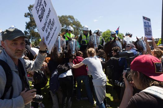 MELTON, VICTORIA/AUSTRALIA - NOVEMBER 2015: Anti Racism protesters violently clashed with reclaim australia groups rallying agsint Mulsim immigration.