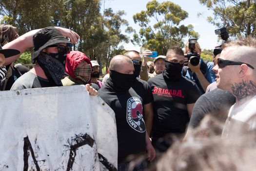 MELTON, VICTORIA/AUSTRALIA - NOVEMBER 2015: Anti Racism protesters violently clashed with reclaim australia groups rallying agsint Mulsim immigration.