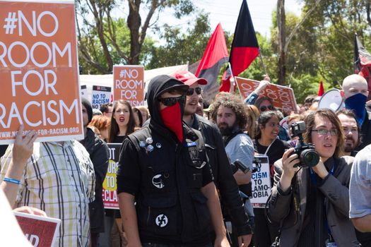 MELTON, VICTORIA/AUSTRALIA - NOVEMBER 2015: Anti Racism protesters violently clashed with reclaim australia groups rallying agsint Mulsim immigration.