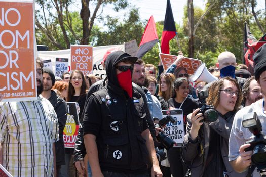 MELTON, VICTORIA/AUSTRALIA - NOVEMBER 2015: Anti Racism protesters violently clashed with reclaim australia groups rallying agsint Mulsim immigration.